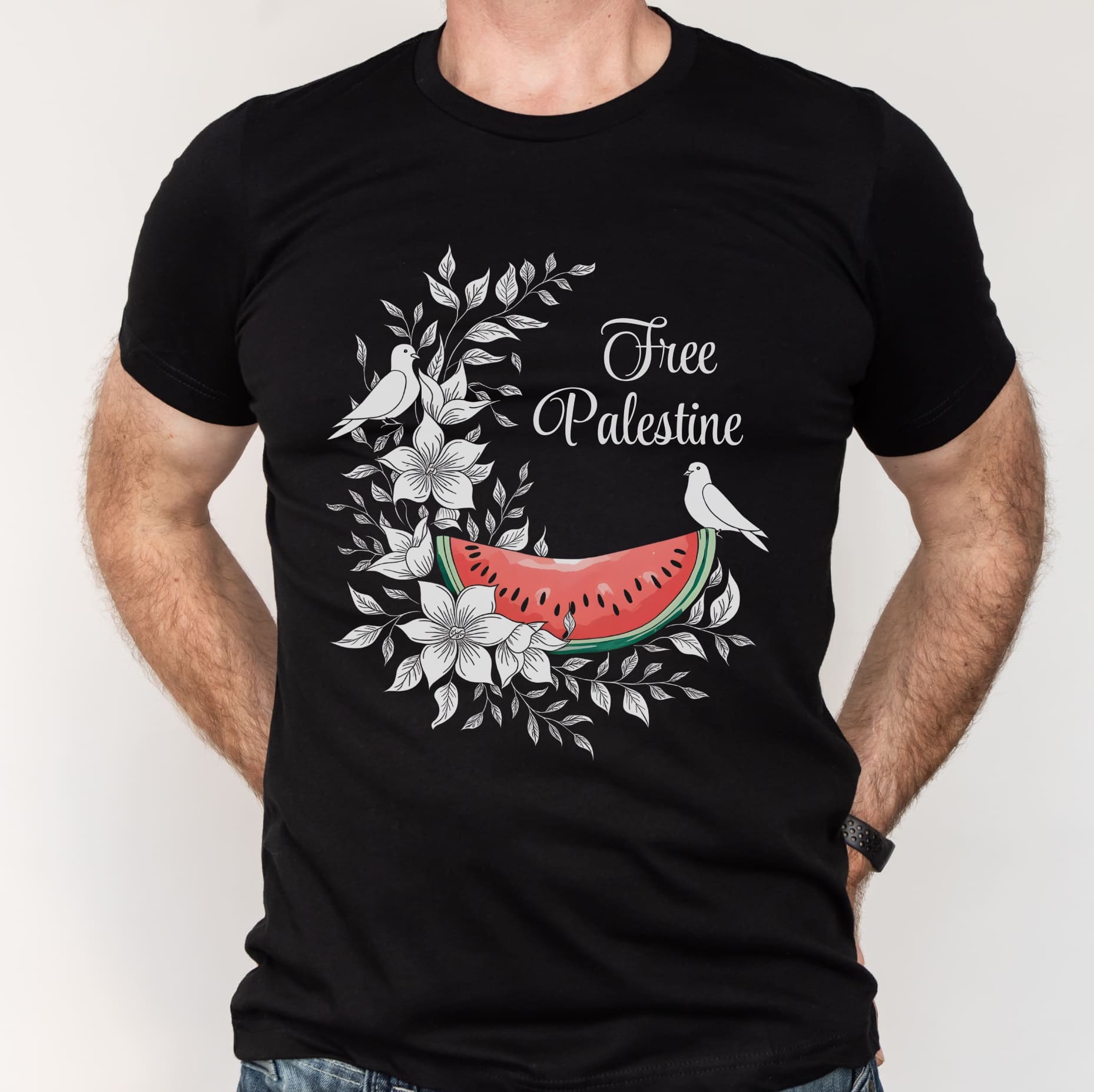 Black t-shirt with 'Free Palestine' design featuring a watermelon slice, birds, and flowers on a white background.