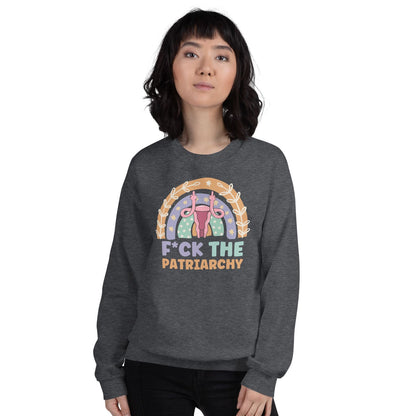 Person wearing a dark gray sweatshirt with a feminist  design and text on a white background