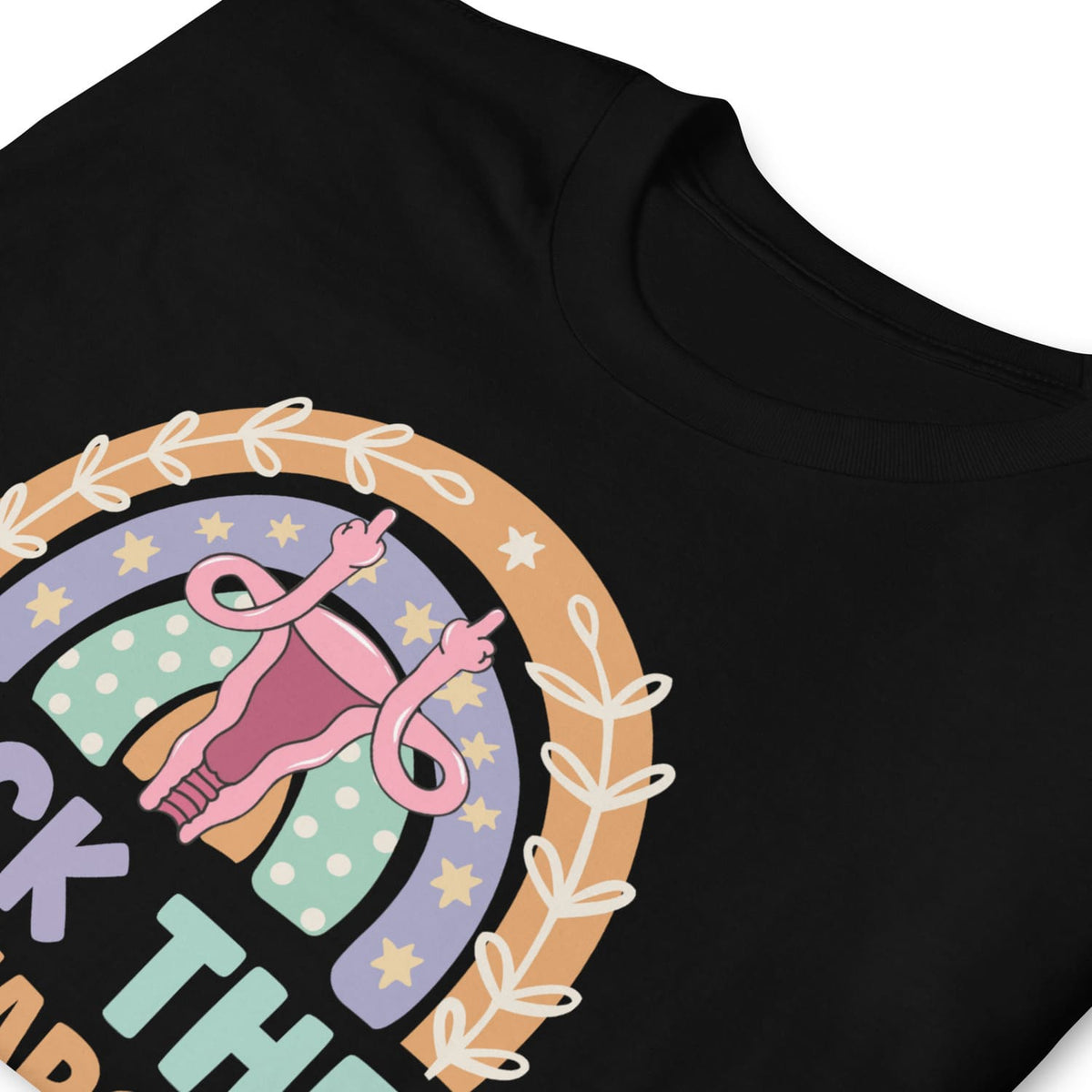 Black t-shirt with feminist graphic design featuring a uterus  and rainbow.