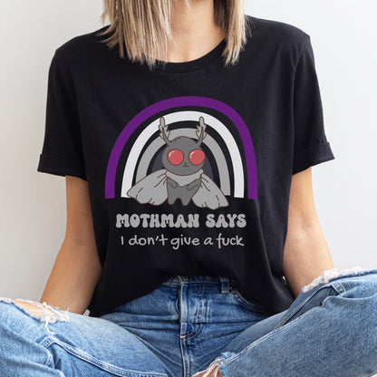 Person wearing a black t-shirt with a graphic design and text, sitting against a plain background: Asexual Mothman Shirt, Funny Ace Pride Cryptid Tee, Folklore Mythology T-Shirt, Queer Cryptozoology Gift, Cryptidcore Weird Stuff, LGBTQ