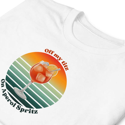 White t-shirt with Aperol Spritz graphic and text on a white background