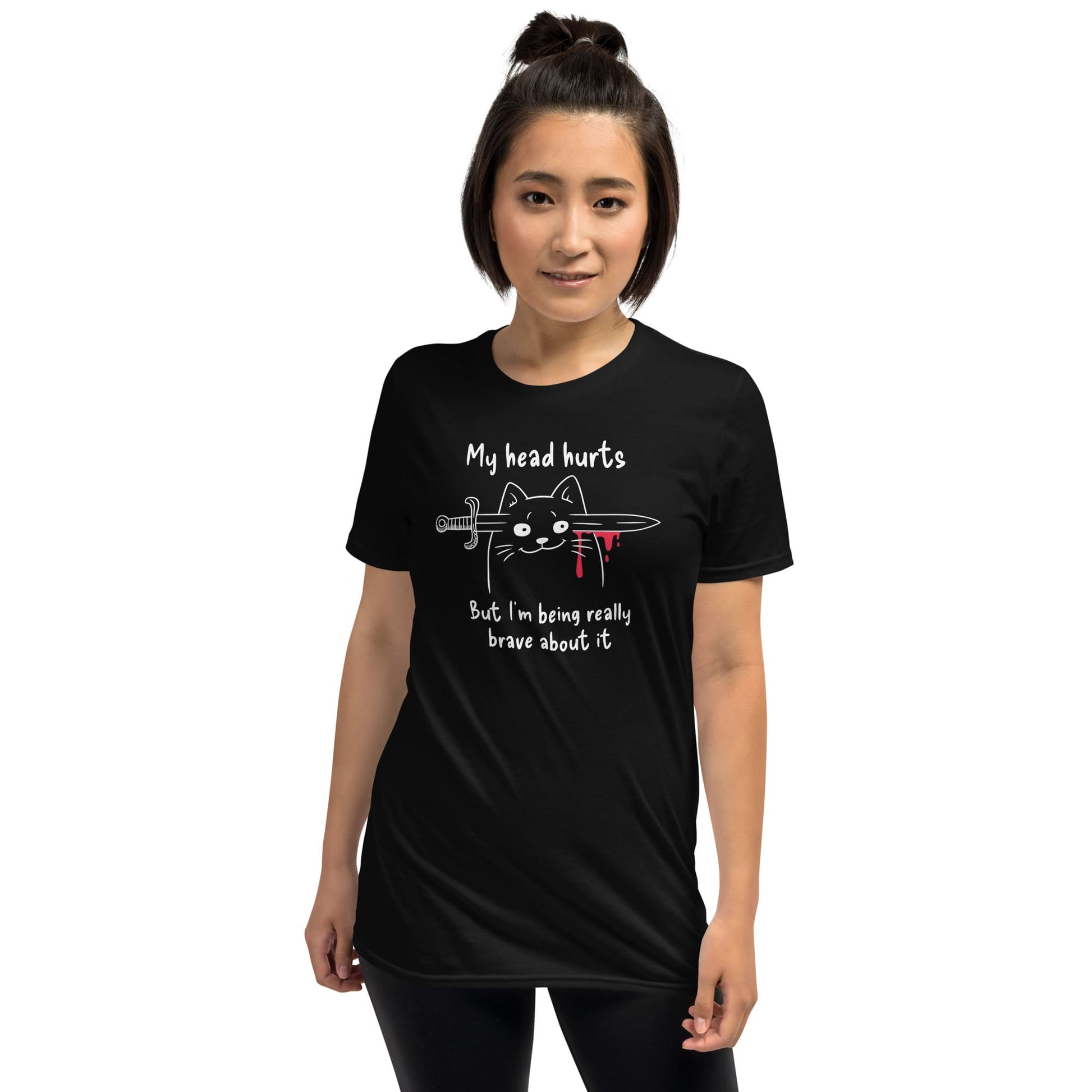 Person wearing a black t-shirt with a graphic and text on a white background: My Head Hurts Shirt, Headache Tee, Chronic Migraine Warrior, Morbid Cat Meme, Funny Spoonie Gift, Mental Illness T-Shirt, Dark Humor