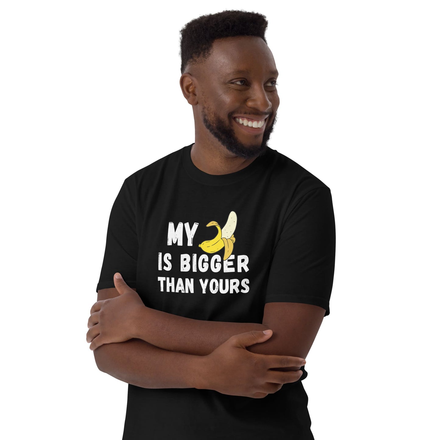 Man wearing a black t-shirt with a banana graphic and text on a white background