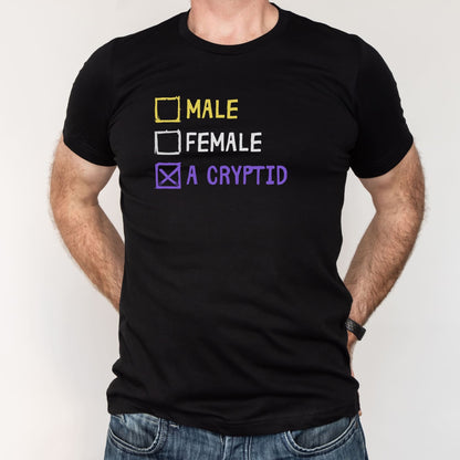 Black t-shirt with gender options and 'A Cryptid' text on a plain background: Funny Nonbinary Shirt, Enby Pride Cryptid Tee, LGBTQ Queer Meme T-Shirt, Cryptidcore Mythology Legend, Weirdcore Gift, Cryptozoology Top