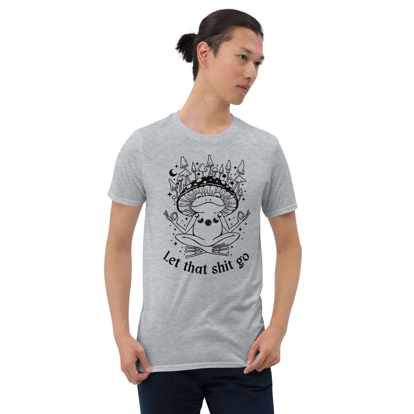 Man wearing a gray t-shirt with a graphic design and text on a white background