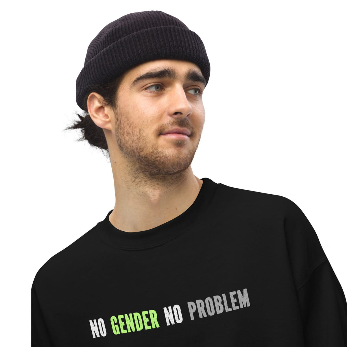 Person wearing a black beanie and a black agender sweatshirt with 'No Gender No Problem' text.