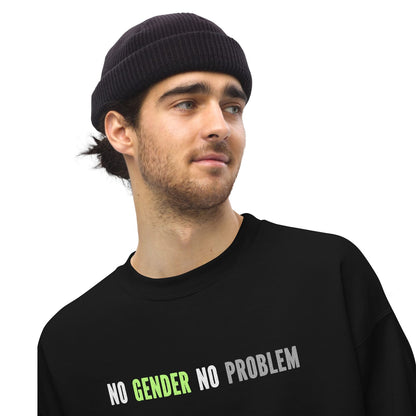 Person wearing a black beanie and a black agender sweatshirt with 'No Gender No Problem' text.