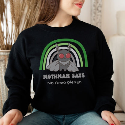 Person wearing a black aromantic sweatshirt with a graphic design of Mothman and text.