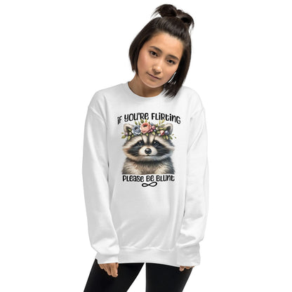 Person wearing a white funny autistic sweatshirt with a raccoon graphic and text on a white background