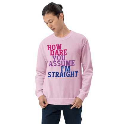 Person wearing a pink bisexual sweatshirt with text on a white background