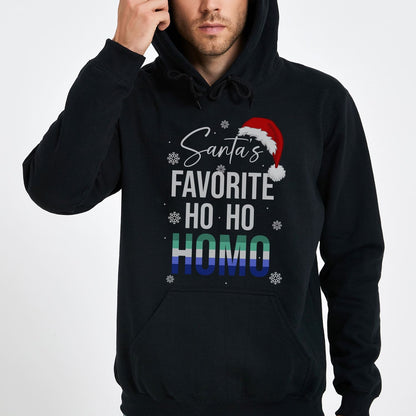 Black MLM gay christmas hoodie with 'Santa's Favorite Ho Ho Homo' text and rainbow design on a white background