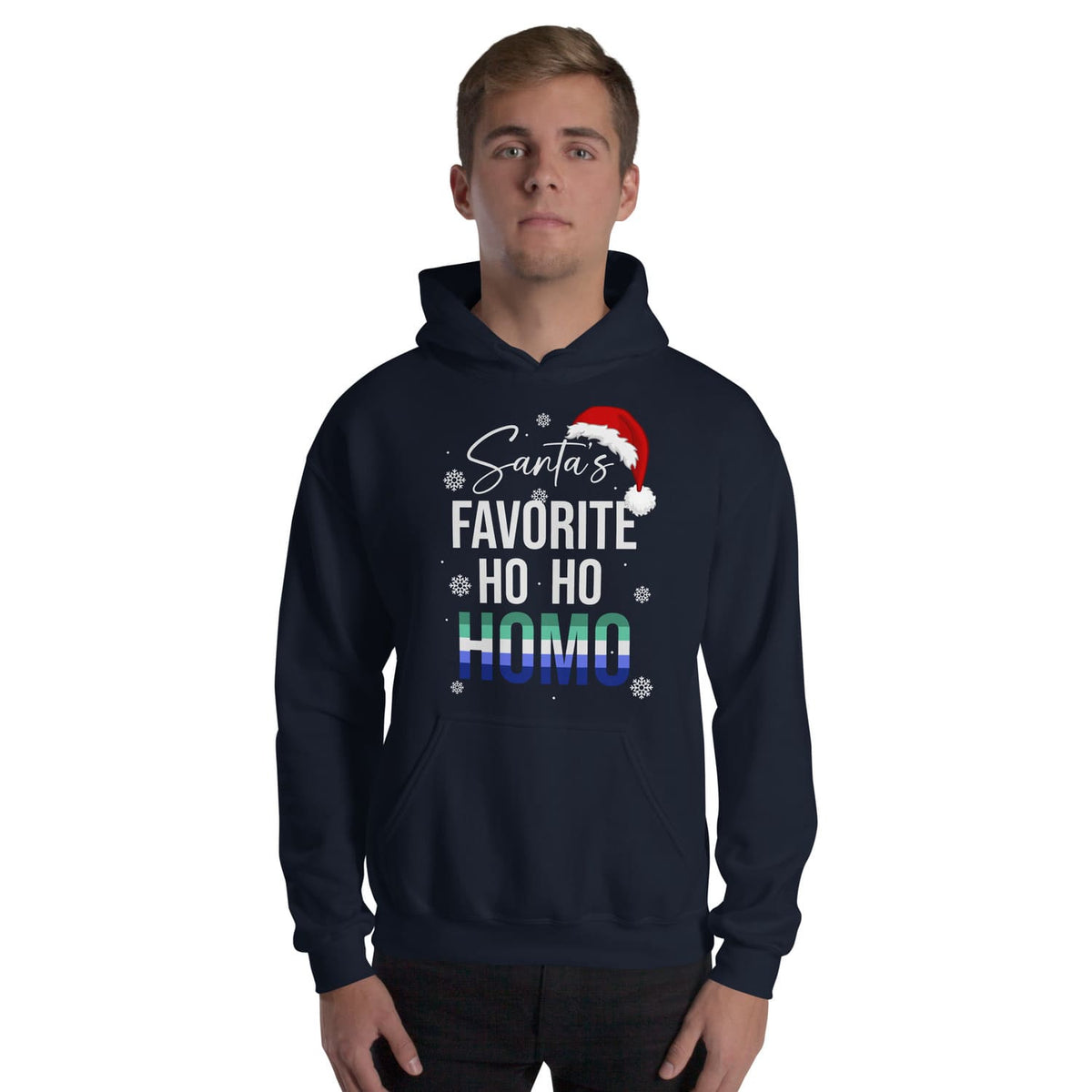 Person wearing a navy MLM gay christmas hoodie with 'Santa's Favorite Ho Ho Homo' text and graphic on a white background