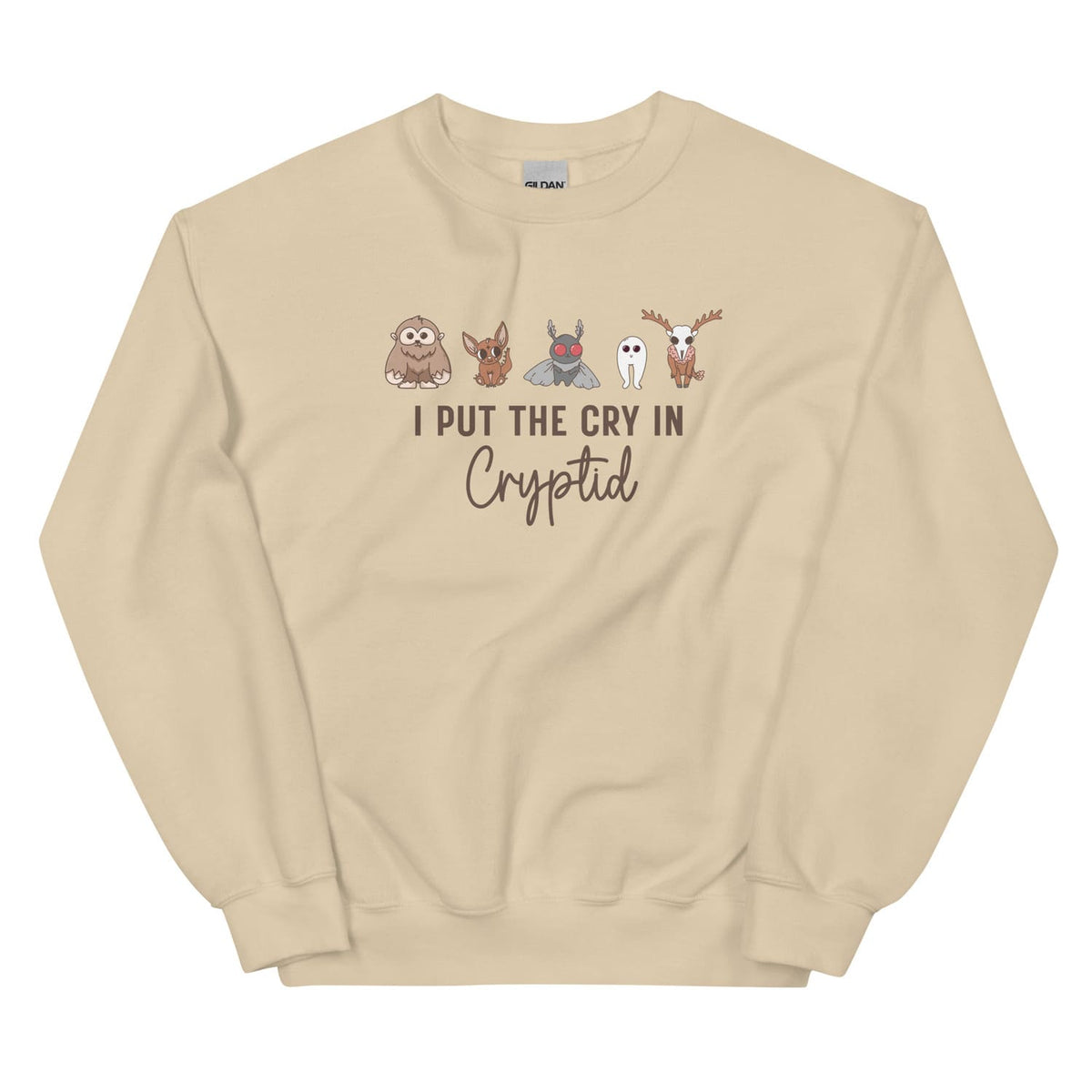 Beige sweatshirt with cryptid characters and text on a white background