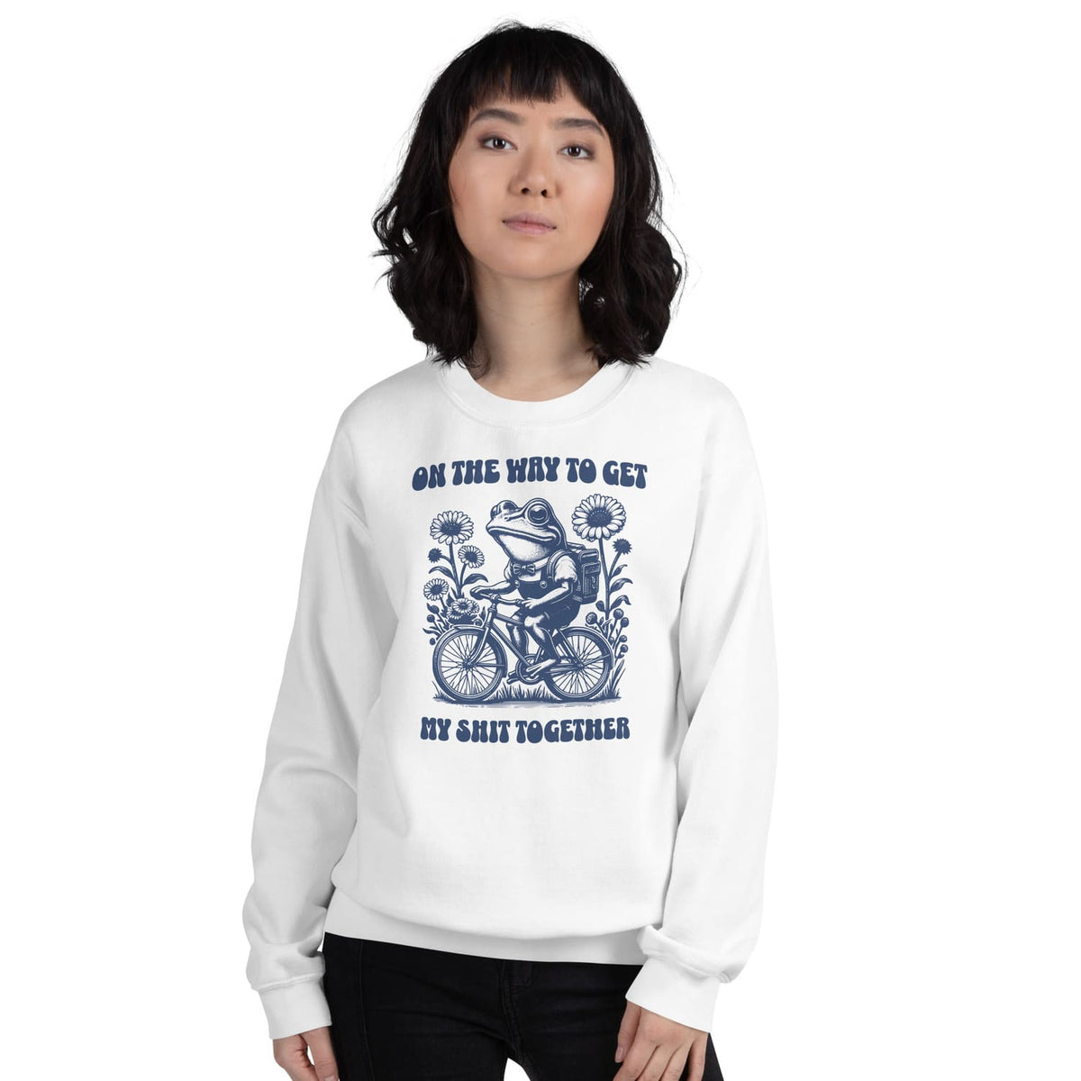 Person wearing a white mental health sweatshirt with a graphic design and text on a white background