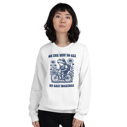 Person wearing a white mental health sweatshirt with a graphic design and text on a white background