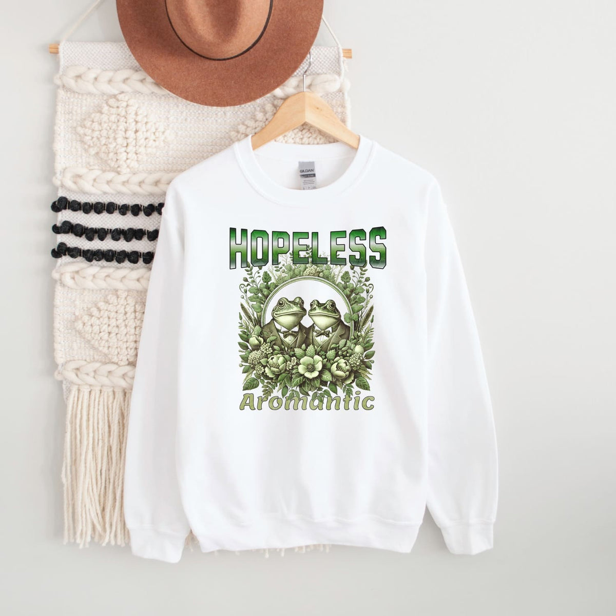 funny aromantic frogs sweatshirt; hanging
