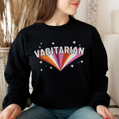 Woman wearing a black lesbian sweatshirt with funny 'VAGITARIAN' design