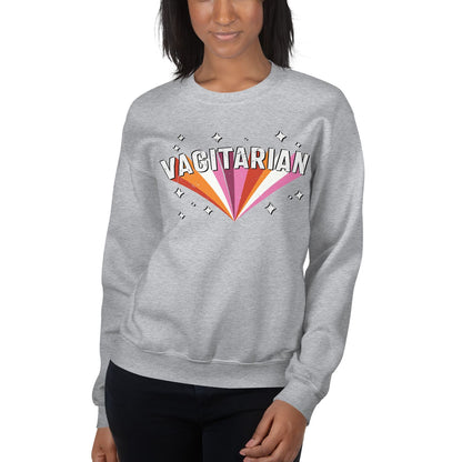 Person wearing a gray sweatshirt with 'VAGITARIAN' design on a white background