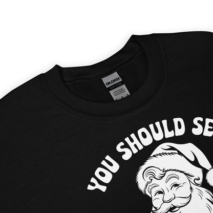 Black sweatshirt with naughty santa graphic and text ' on a white background
