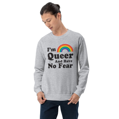 Person wearing a gray queer lgbt sweatshirt with a rainbow and text design on a white background