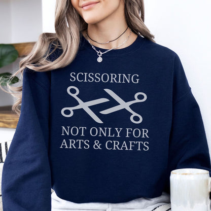 woman wearing funny sapphic scissoring sweatshirt