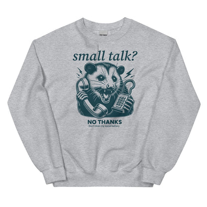 Gray social anxiety sweatshirt with an opossum holding a phone graphic and text on a white background
