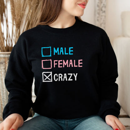 Transgender mtf wearing a funny discreet trans pride sweatshirt with text checkboxes 'Male', 'Female', and 'Crazy'.