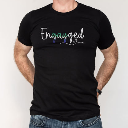 Black t-shirt with gay MLM engagement 'Engayged' text on a plain background