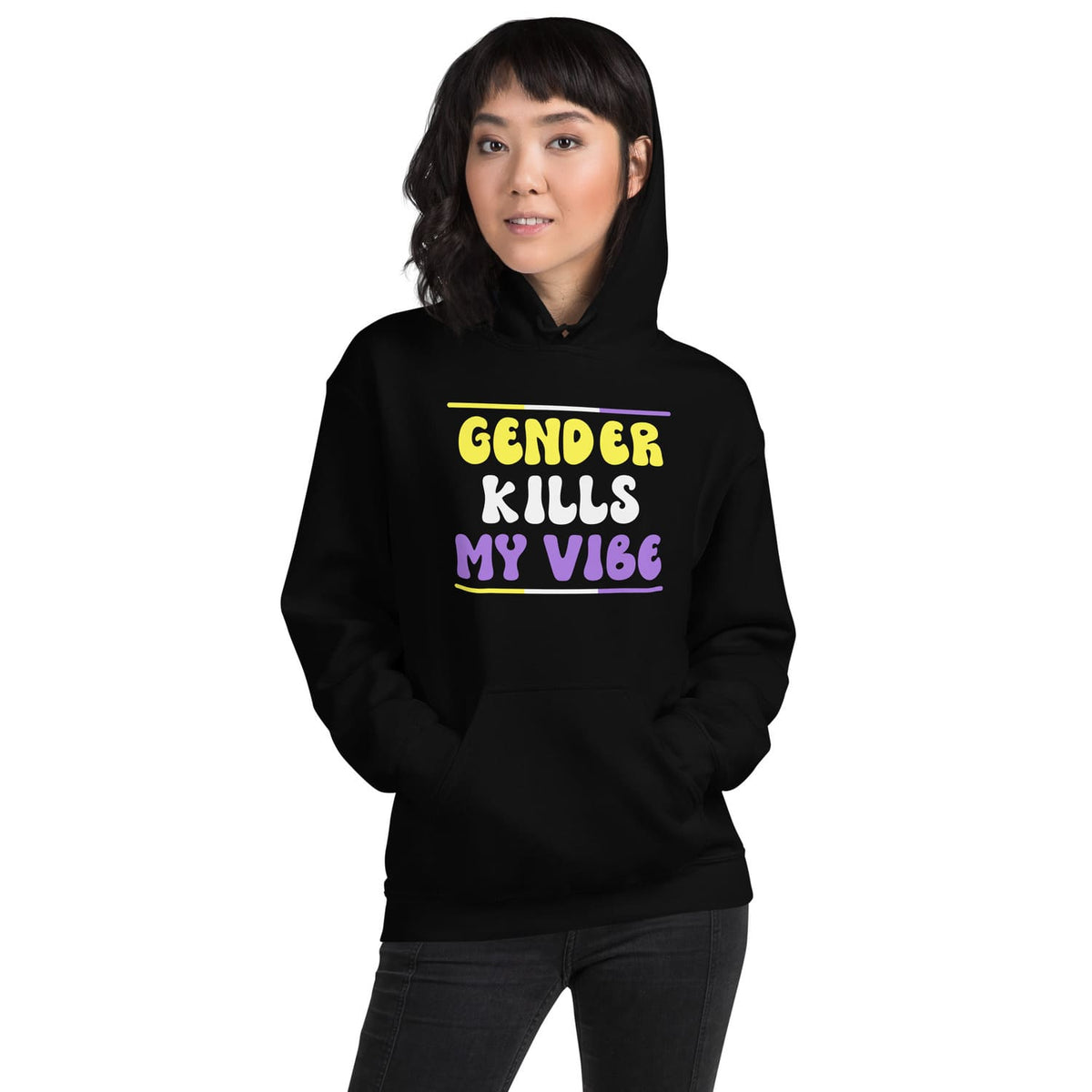 Person wearing a black nonbinary hoodie with 'GENDER KILLS MY VIBE' text on a white background