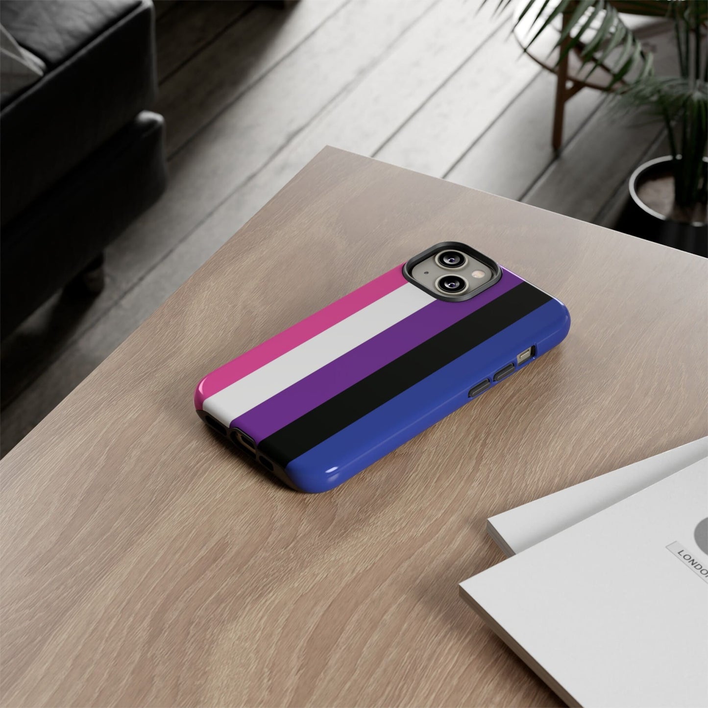 genderfluid flag phone case, on table