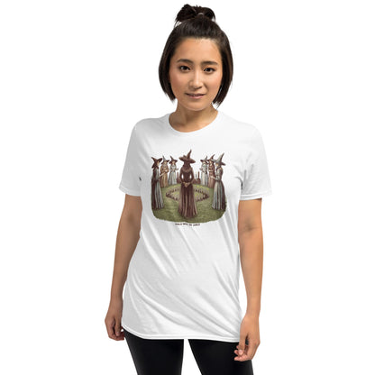 Person wearing a white t-shirt with a graphic design on a plain background