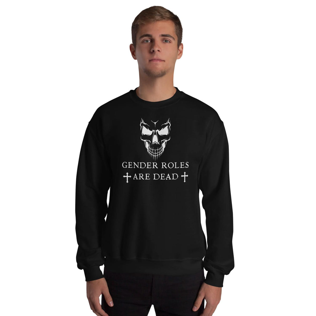Person wearing a black nonbinary sweatshirt with a skull design and text on a white background