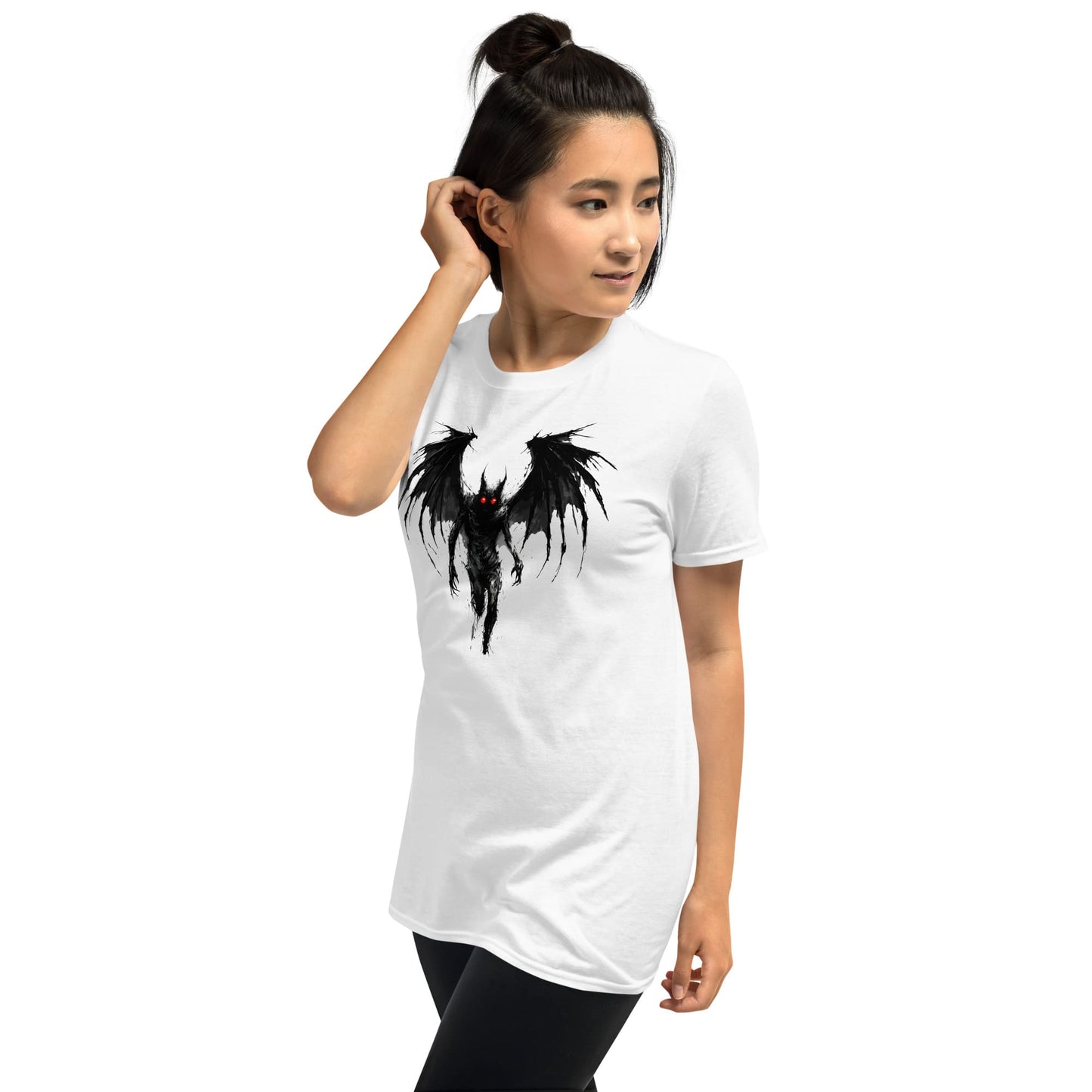 Woman wearing a white t-shirt with a black mothman design on a white background
