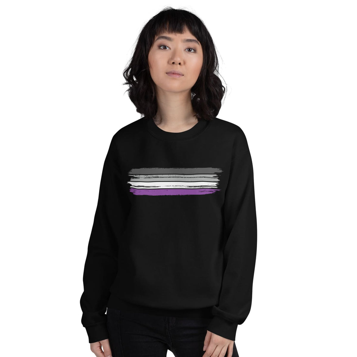 Person wearing a black asexual sweatshirt with a grunge flag  design on a white background