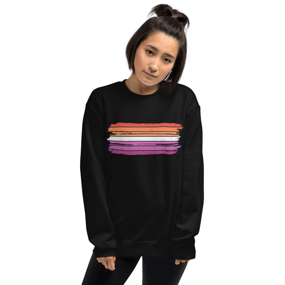 Person wearing a black lesbian sweatshirt with colorful stripes on a white background