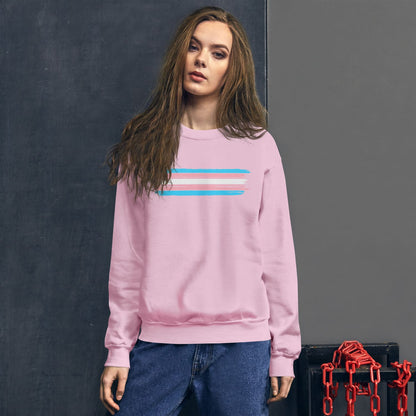 Woman wearing a pink transgender sweatshirt with flag  against a dark background