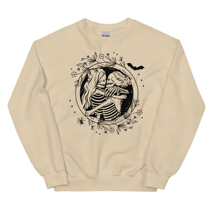 Beige lesbian sweatshirt with a black skeleton couple design on a white background