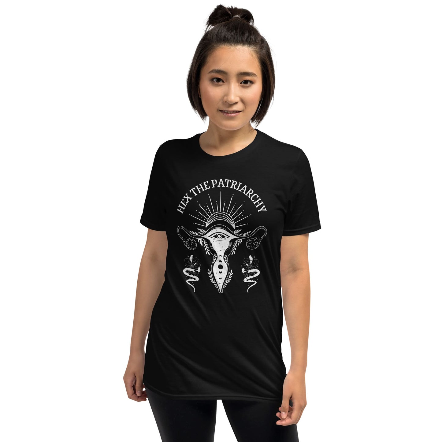 Person wearing a black t-shirt with a graphic design and text on a white background
