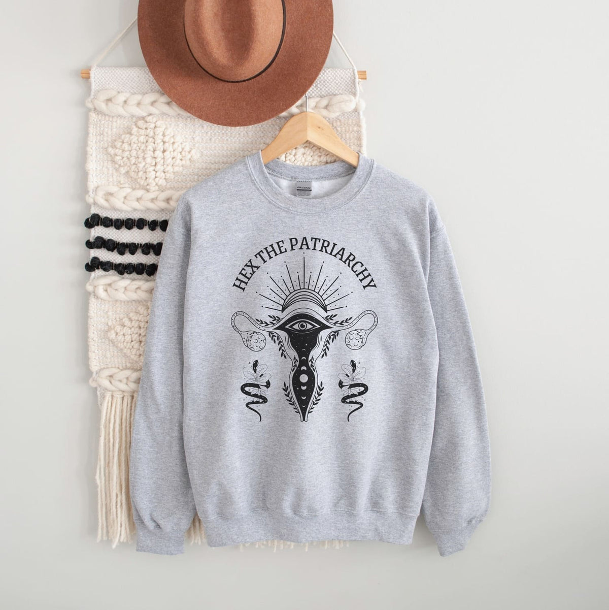 hex the patriarchy feminist sweatshirt, grey, hanging