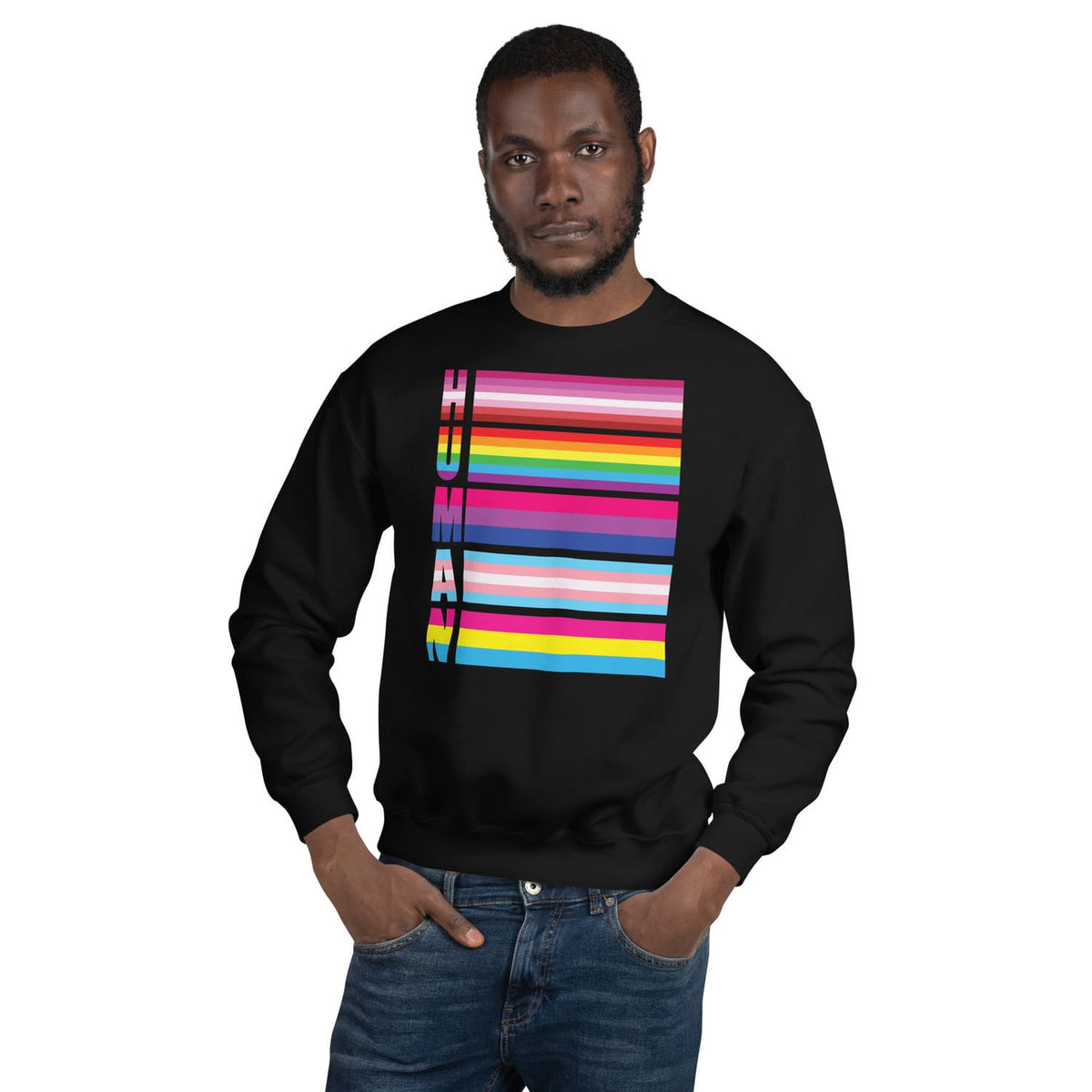 Person wearing a black LGBTQ sweatshirt with a colorful 'HUMAN' pride flags design on a white background