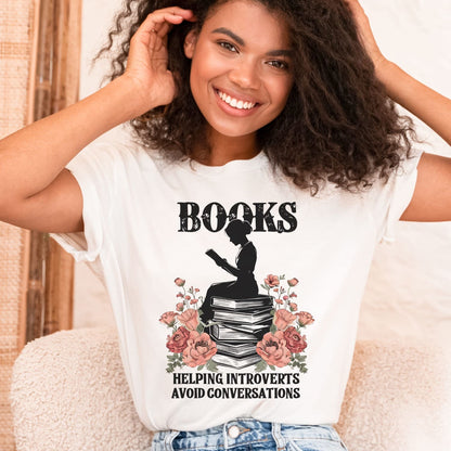 Woman wearing a white t-shirt with a book-themed design for introverts