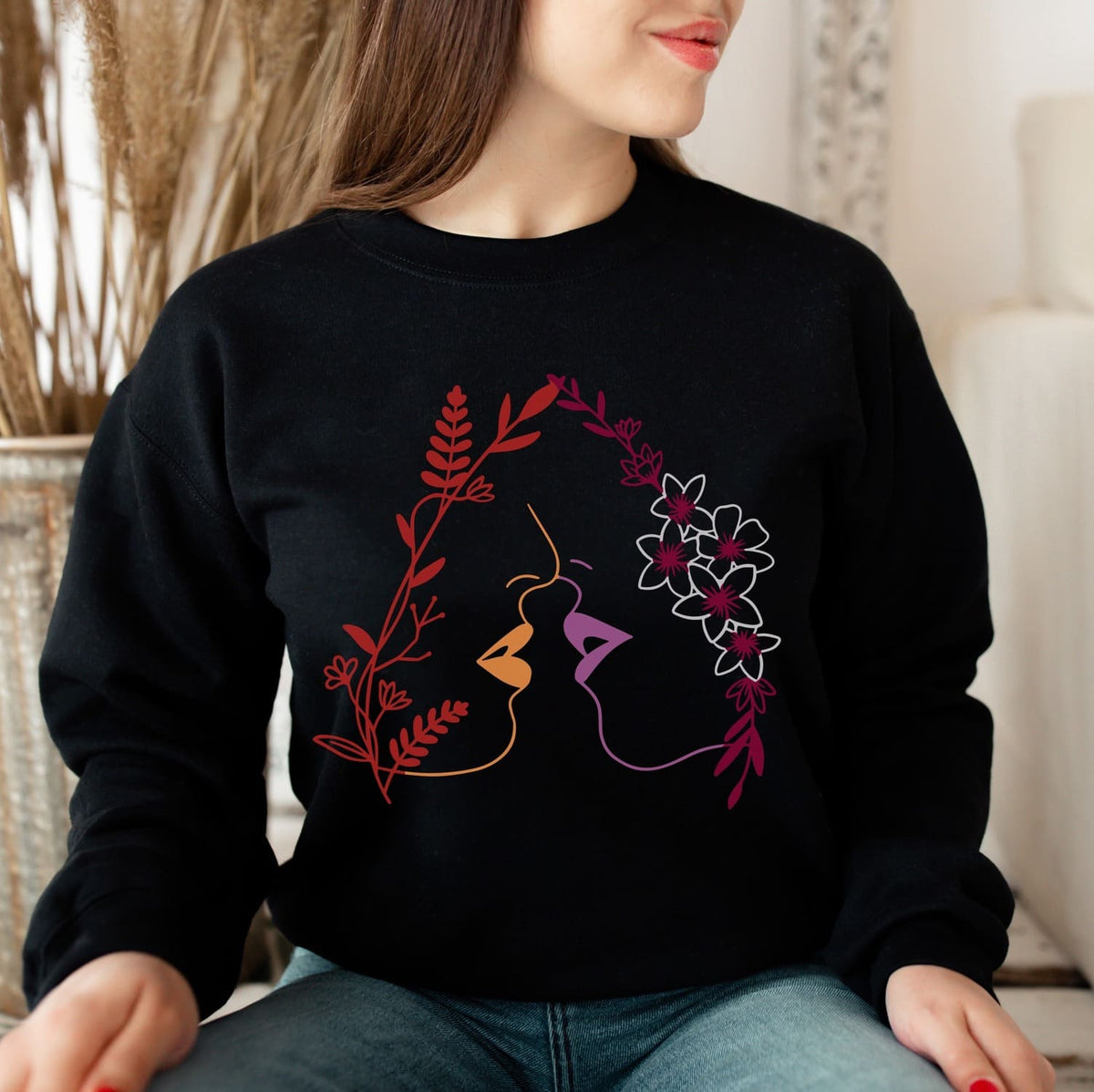 woman wearing line art lesbian sweatshirt