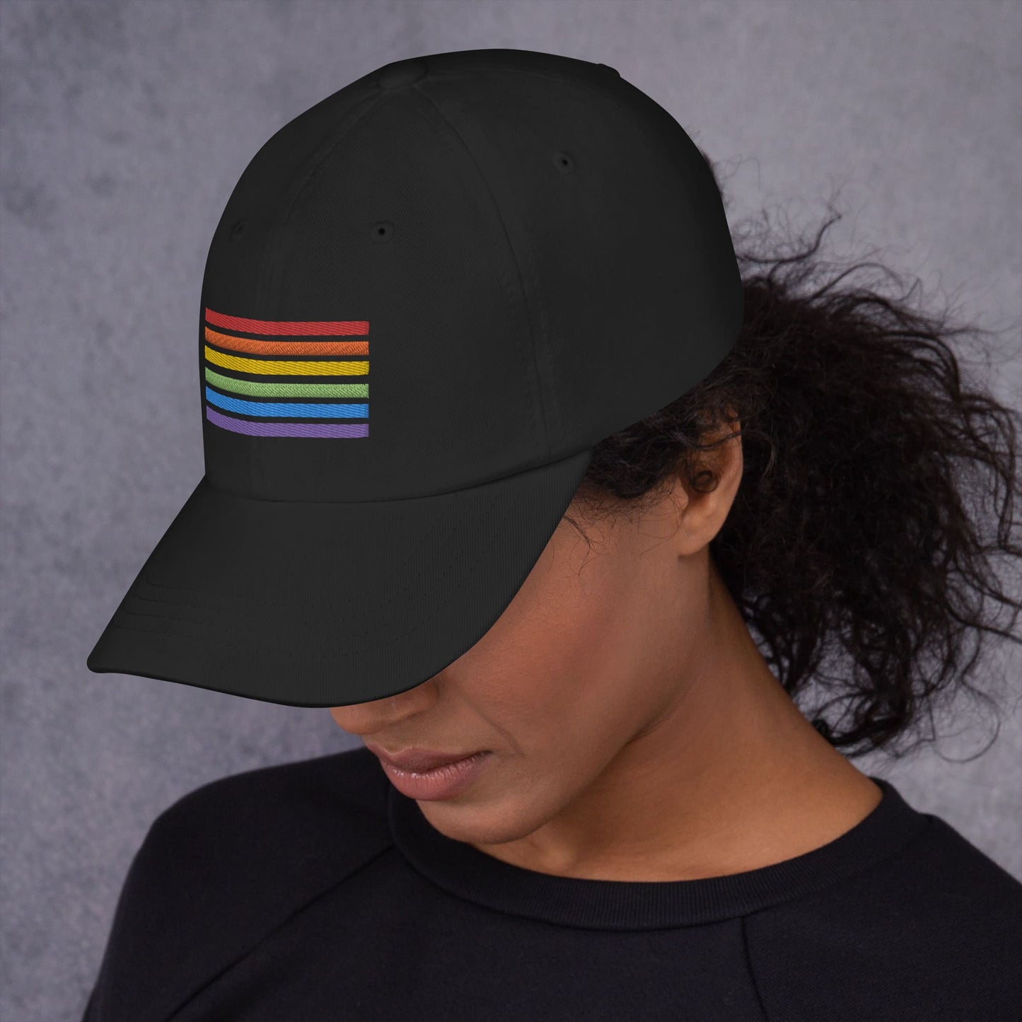 LGBT pride hat, rainbow flag embroidered cap, model left