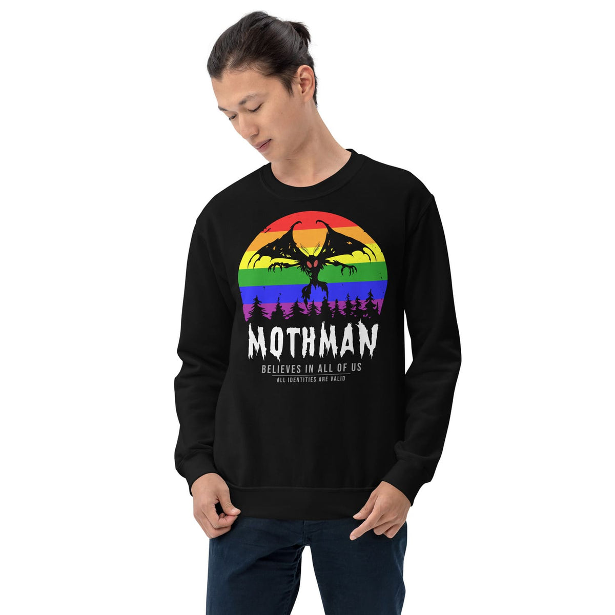 Person wearing a black pride sweatshirt with a rainbow Mothman graphic and text.