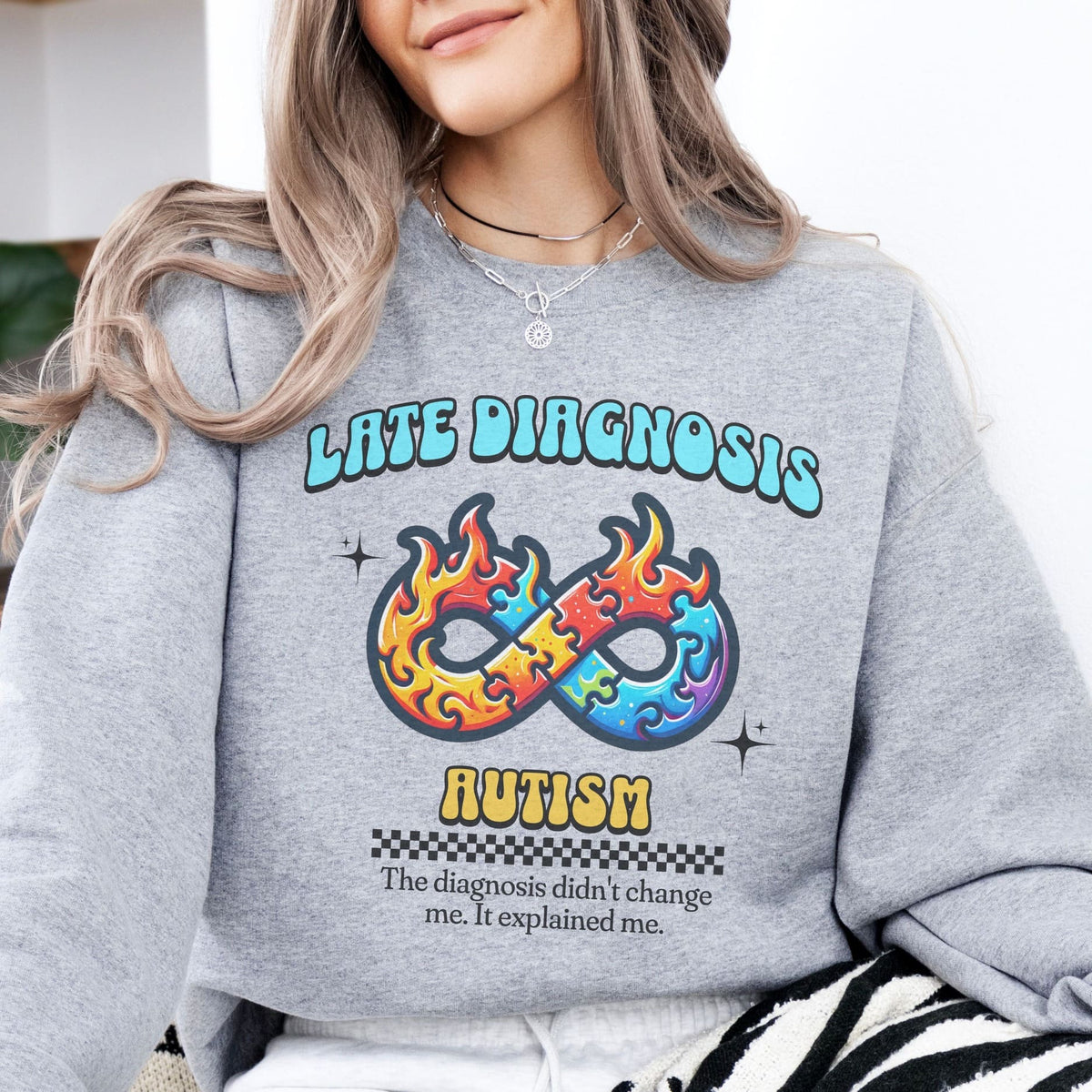 woman wearing Late diagnosis autism sweatshirt