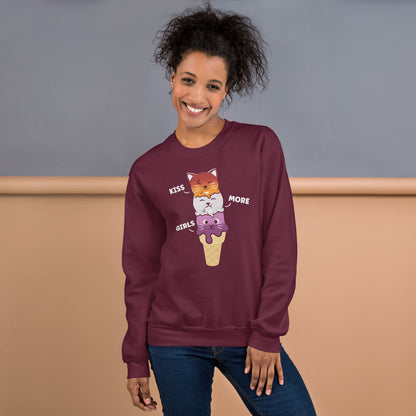 Woman wearing a maroon sweatshirt with a subtle lesbian cartoon designs and text, standing against a plain background.