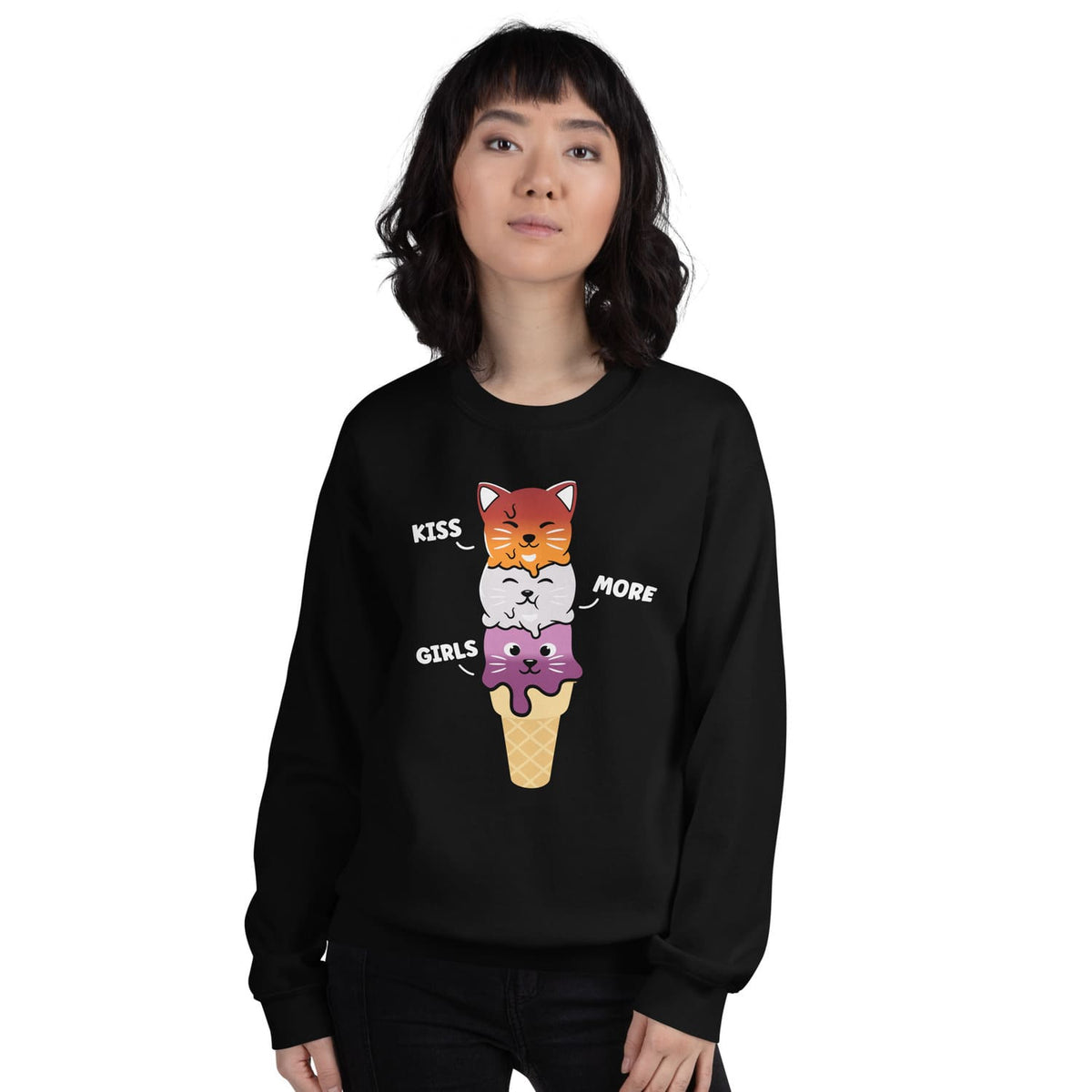 Person wearing a black lesbian sweatshirt with colorful cat designs and text.