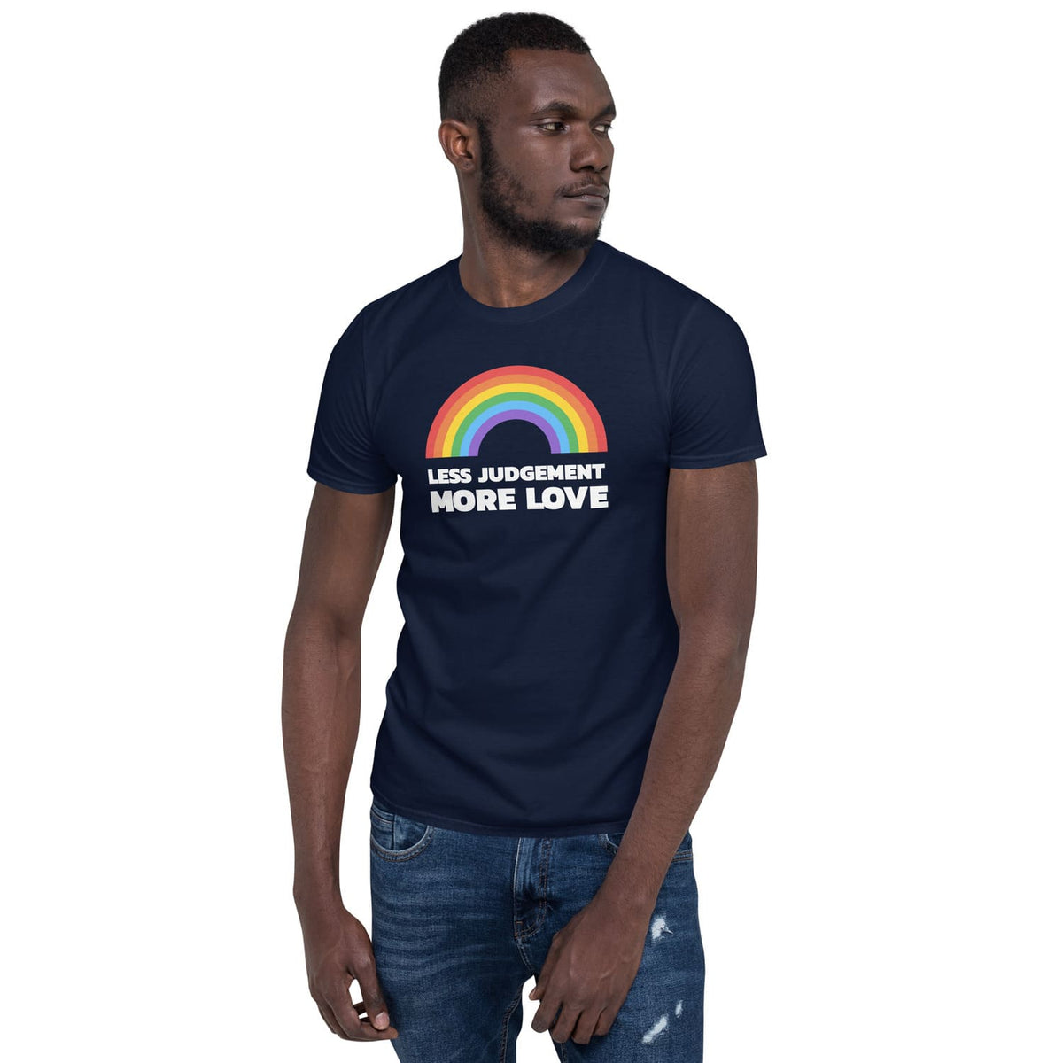 Person wearing a navy blue pride t-shirt with a rainbow and text design on a white background