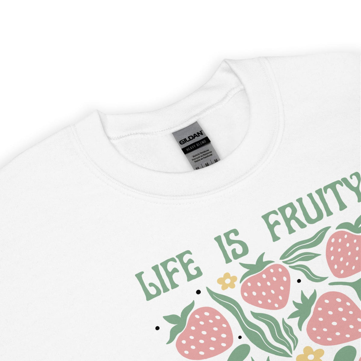 White sweatshirt with 'Life is Fruity' text and strawberry graphics on a white background