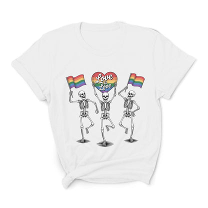 White t-shirt with skeletons holding rainbow flags and 'Love is Love' sign on a white background: Pride Skeleton Shirt, Love Is Love Gay Queer Halloween Tee, LGBTQ Dancing Skeletons T-Shirt, Rainbow LGBT Spooky Season Gift